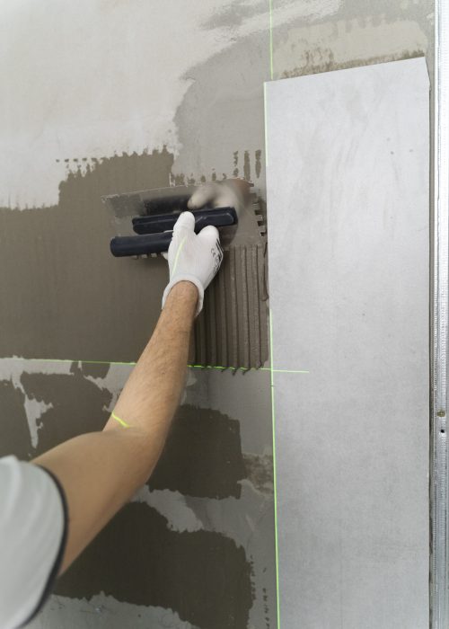 tiler-working-renovation-apartment tiler-working-renovation-apartment